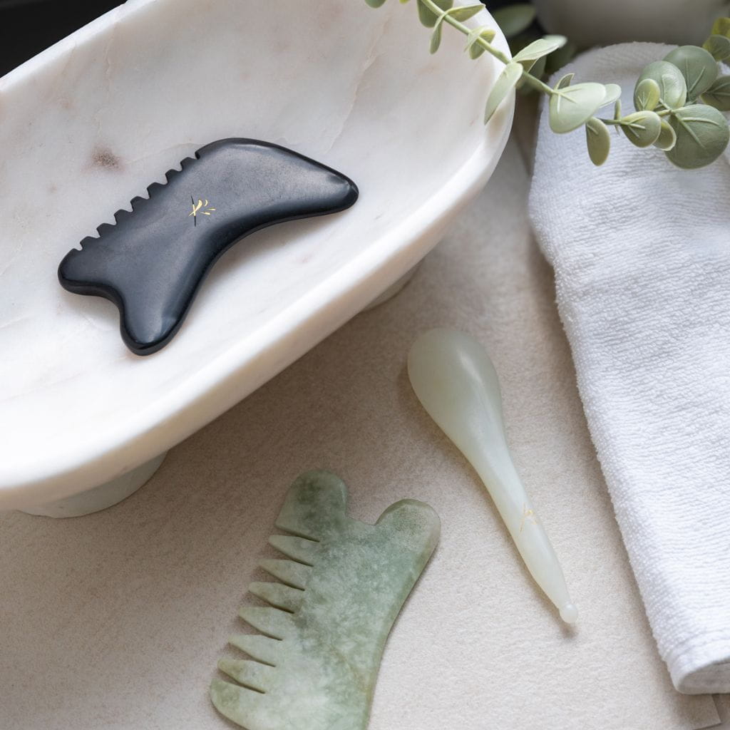 Yin Your Skin Gua sha kampa, lasta ja lusikka
